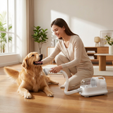 Woman grooming a golden retriever with PetPouch Grooming Vacuum Kit at home
